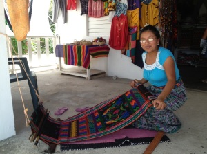 Dodi creates beautiful tapestries on her loom. Each takes 6-8 hours. She did not mention having property in Placencia for sale.